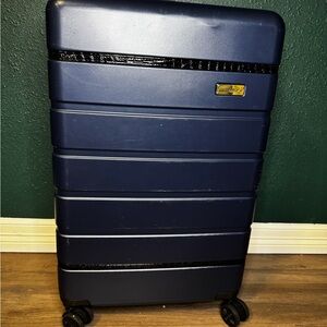 Samantha Brown 30in Spinner Large Rolling Luggage